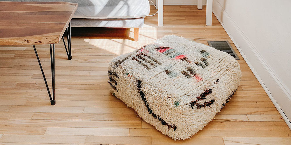 https://thewoolrugs.com/cdn/shop/collections/floor-cushions-collection.jpg?v=1638024972