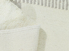 Load image into Gallery viewer, Artisan-crafted Moroccan Berber rug with neutral tones


