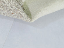 Load image into Gallery viewer, Beni Ourain-inspired nursery rug in soft wool with hand-tied fringes and geometric lines


