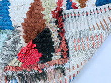 Load image into Gallery viewer, Sustainable handmade Moroccan rug with rich colors.

