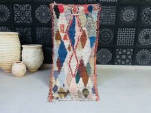 Load image into Gallery viewer, Handmade Moroccan Boucherouite rug with vibrant geometric patterns.
