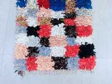 Load image into Gallery viewer, Small Moroccan rug with bold multicolor patterns.
