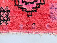 Load image into Gallery viewer, Pink Moroccan rug with unique tribal motifs and geometric designs.
