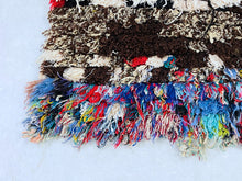 Load image into Gallery viewer, Eco-friendly recycled material rug in multicolor tones.

