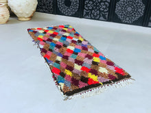 Load image into Gallery viewer, Close-up of Boucherouite wool rug, showcasing vibrant retro-inspired hues.

