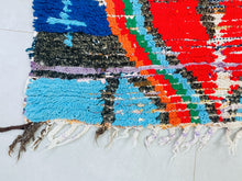 Load image into Gallery viewer, Moroccan statement rug with colorful accents
