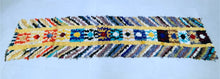 Load image into Gallery viewer, Handmade Moroccan statement rug for creative spaces.

