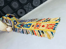 Load image into Gallery viewer, Handmade Moroccan runner rug featuring a mix of bright hues.
