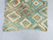 Load image into Gallery viewer, Artisanal Boucherouite rug adding warmth and texture to a space.
