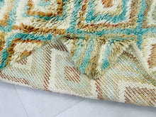 Load image into Gallery viewer, Soft and vibrant Moroccan floor rug perfect for cozy interiors.
