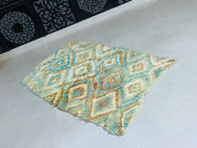 Load image into Gallery viewer, Cozy Moroccan rug featuring intricate geometric diamond patterns.
