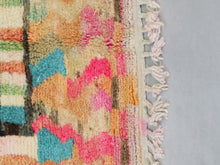 Load image into Gallery viewer, Bright pink and green Moroccan rug adding a pop of color.
