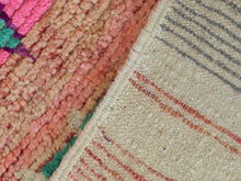 Load image into Gallery viewer, Handcrafted Moroccan rug with vibrant pink and green elements.
