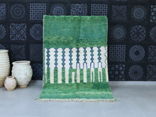 Load image into Gallery viewer, Handmade Moroccan wool rug in green and white tones.
