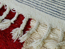 Load image into Gallery viewer, Unique bohemian rug with vibrant red and pink accents.
