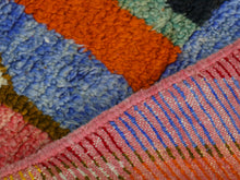 Load image into Gallery viewer, Vibrant Berber art rug displayed in a contemporary setting.