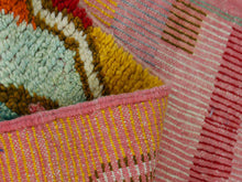 Load image into Gallery viewer, Close-up of the colorful Moroccan rug texture and patterns.
