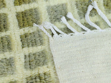 Load image into Gallery viewer, Modern Berber carpet featuring a soft cream background with green accents.
