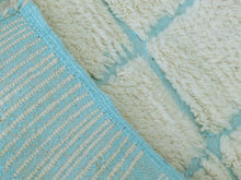 Load image into Gallery viewer, Modern Moroccan wool rug with a soothing cream and blue design.
