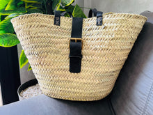 Load image into Gallery viewer, This bag is handwoven in the souks of Morocco, from a palm leaf. It is a &quot;Slow Fashion&quot; product representing everything that is eco, ethical and green. Even though this Spring &amp; Summer season is all about straw
