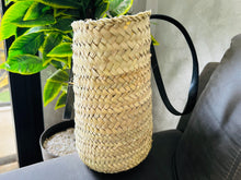 Load image into Gallery viewer, This bag is handwoven in the souks of Morocco, from a palm leaf. It is a &quot;Slow Fashion&quot; product representing everything that is eco, ethical and green. Even though this Spring &amp; Summer season is all about straw
