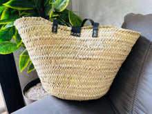 Load image into Gallery viewer, This bag is handwoven in the souks of Morocco, from a palm leaf. It is a &quot;Slow Fashion&quot; product representing everything that is eco, ethical and green. Even though this Spring &amp; Summer season is all about straw
