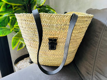 Load image into Gallery viewer, This bag is handwoven in the souks of Morocco, from a palm leaf. It is a &quot;Slow Fashion&quot; product representing everything that is eco, ethical and green. Even though this Spring &amp; Summer season is all about straw
