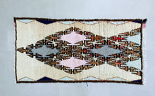 Load image into Gallery viewer, Moroccan 3x6 ft tribal rug in earthy tones with pink and blue accents.

