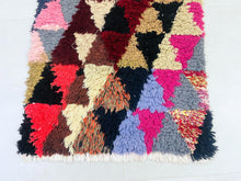 Load image into Gallery viewer, Artistic and sustainable Moroccan rug with a playful geometric design.
