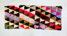 Load image into Gallery viewer, Handwoven Moroccan rug featuring bold and vibrant geometric designs.
