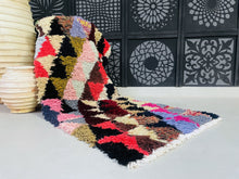 Load image into Gallery viewer, Handwoven Moroccan rug featuring bold and vibrant geometric designs.
