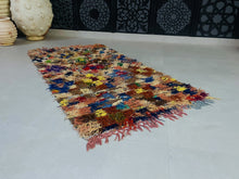 Load image into Gallery viewer, Handwoven Moroccan rug featuring vibrant and lively colors.
