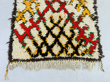 Load image into Gallery viewer, Authentic Moroccan wool rug featuring bold and cheerful colors.
