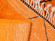 Load image into Gallery viewer, Colorful orange rug with a Beni Ourain-inspired pattern, handcrafted from wool for a cozy and stylish interior.


