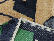 Load image into Gallery viewer, Artistic floor rug featuring a mix of earth tones and brights


