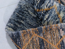 Load image into Gallery viewer, Artisan-made area rug with earthy palette and warm detail


