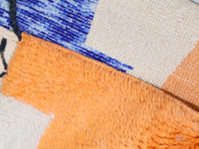 Load image into Gallery viewer, One-of-a-kind Moroccan wool rug combining tradition with colorful modern flair.


