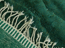 Load image into Gallery viewer, Moroccan handmade rug placed in front of decorative tiles



