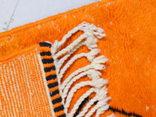 Load image into Gallery viewer, Wool Moroccan rug with abstract geometric lines, handmade in bright orange—ideal for boho, Japandi, or modern homes.


