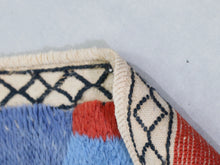 Load image into Gallery viewer, Handmade Moroccan rug with multicolor geometric shapes perfect for living rooms.


