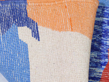Load image into Gallery viewer, Boho wool rug with a rich palette of blue, red, orange, and beige.


