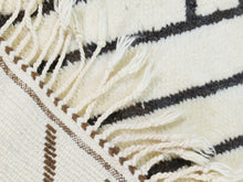 Load image into Gallery viewer, Ivory and black rug for minimalist home decor

