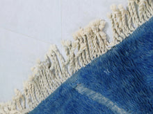 Load image into Gallery viewer, Handmade Berber rug in Moroccan navy wool, showcasing large-scale geometric patterns that add elegance to any living space.


