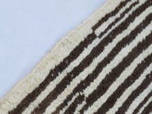Load image into Gallery viewer, Black and white Moroccan rug with artisan stripe design

