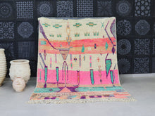 Load image into Gallery viewer, Handwoven Moroccan wool rug with vibrant pink and green abstract patterns.
