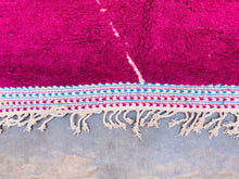 Load image into Gallery viewer, Macro shot of a Moroccan rug&#39;s texture, emphasizing the thick pile and vibrant colors.
