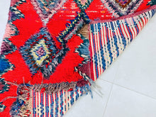 Load image into Gallery viewer, Moroccan rug styled as a centerpiece in a bohemian living room.
