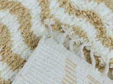 Load image into Gallery viewer, Boho-chic wool rug featuring cream and gold tones.

