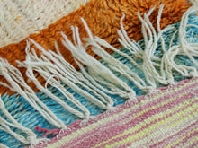 Load image into Gallery viewer, Close-up of colorful chevron pattern on Moroccan wool rug.
