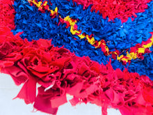 Load image into Gallery viewer, Plush Moroccan rug with rich blue and red tones
